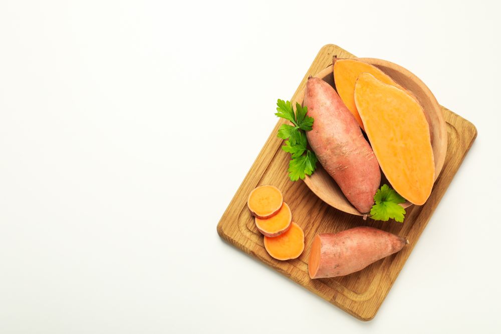 Concept of vegetables, sweet potato, space for text