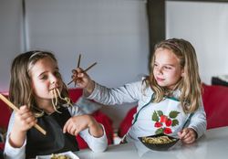 Kids eating vegan food at home