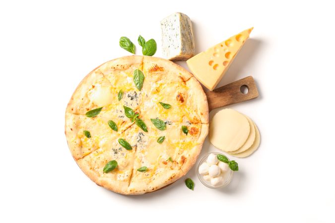 Tasty cheese pizza on wood board and ingredients isolated on plain background