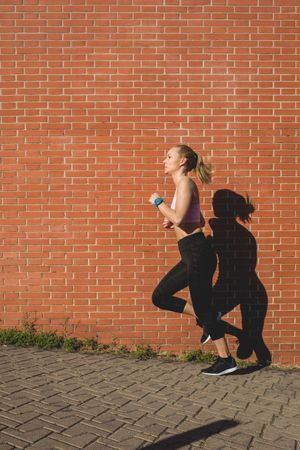 Young woman jogging outdoors