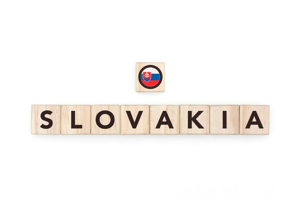 Wooden blocks bearing the name and flag of Slovakia. Slovak and East European Culture, national identity, travel, and geography in a copy space design.