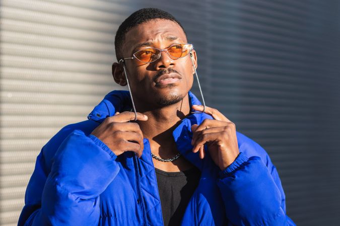 Stylish Black man in sunglasses on street