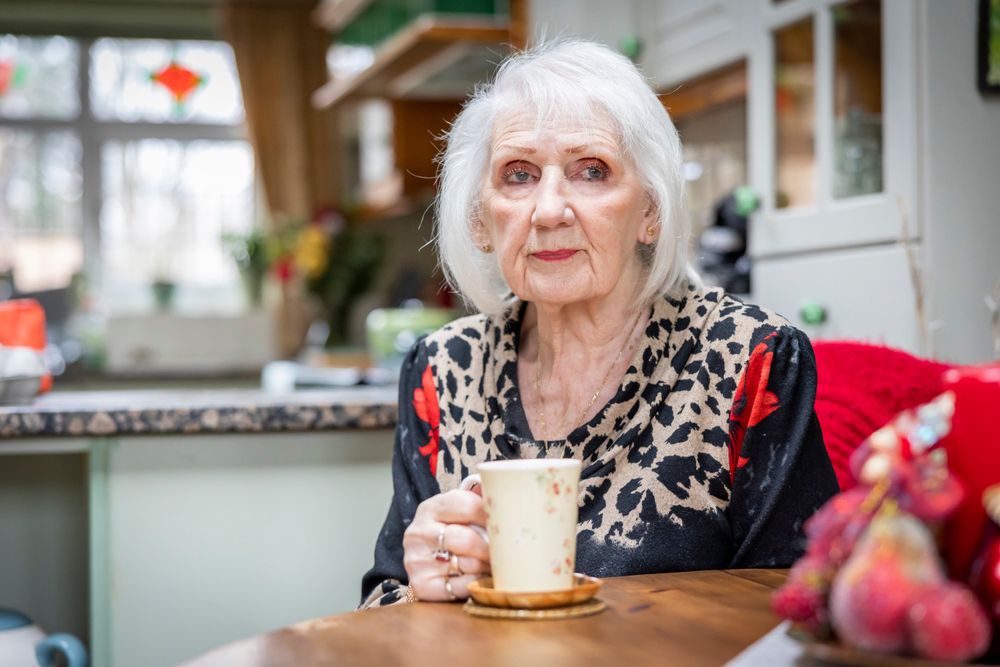 Woman with cup of tea