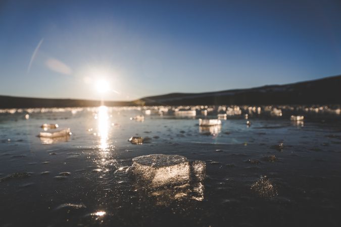 Pieces of ice on cold water