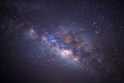 milky way galaxy with cloud and space dust in the universe, Long exposure photograph, with grain.
