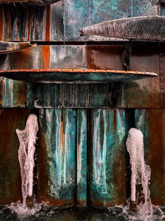 Colorful metal corrosion on fountain