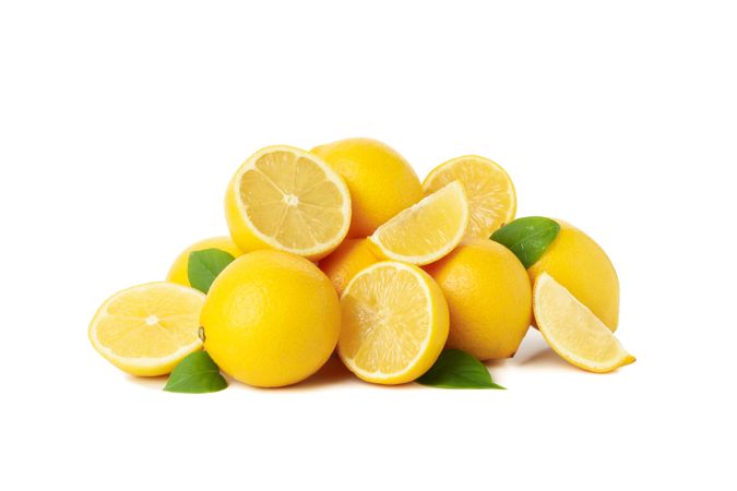 Fresh lemons isolated on light background. Ripe fruit