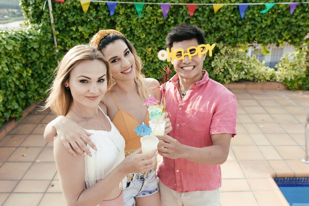 Group of friends having a pool party