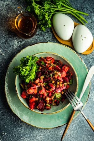 Top view of healthy beetroot salad on stone background with copy space