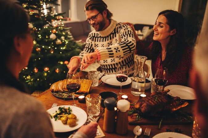 European family having Christmas dinner together