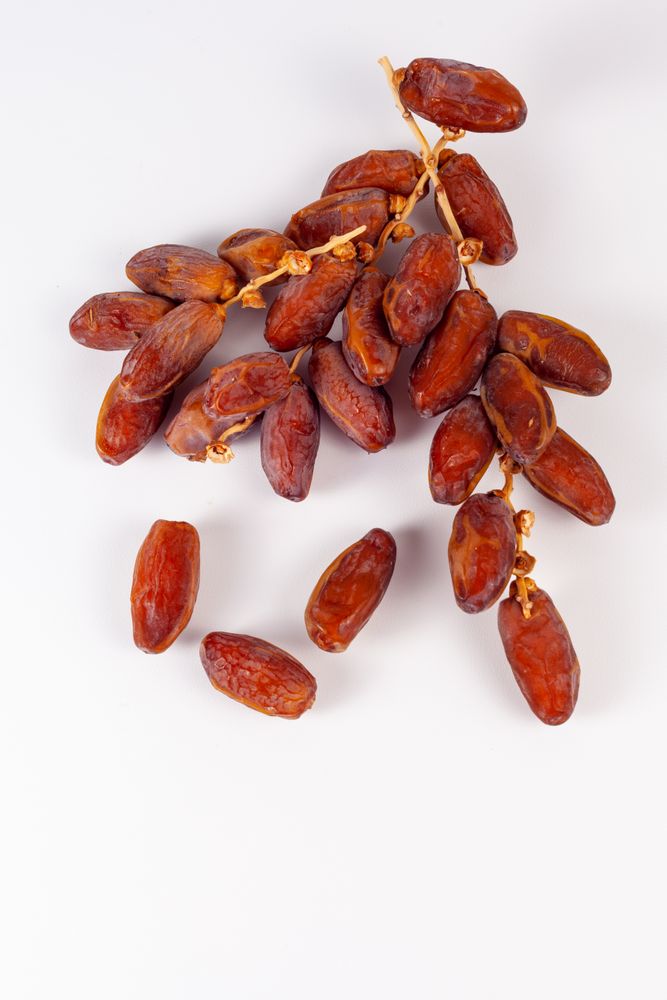 Sweet Dates On Plain Background