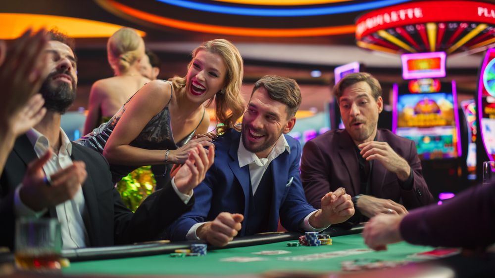 High-Stakes Poker Championship in Casino, Glamorous Players Place Bets, Reveal Cards.