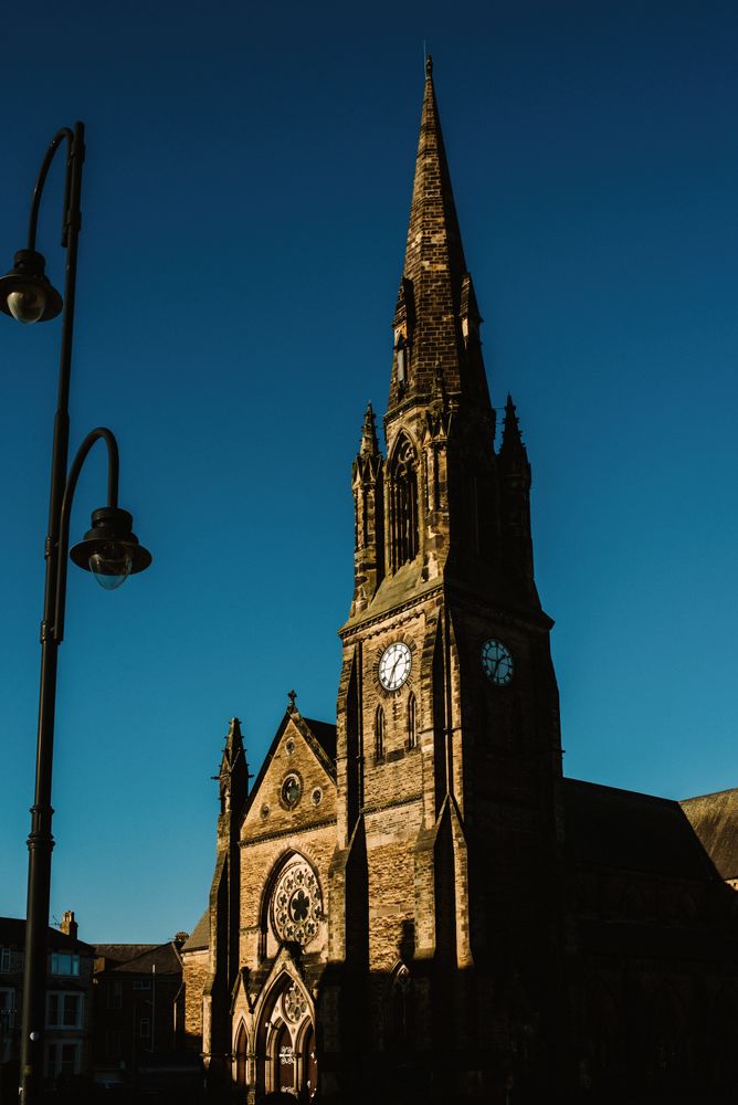 View of historic stone church in Yorkshire, England in sunny day