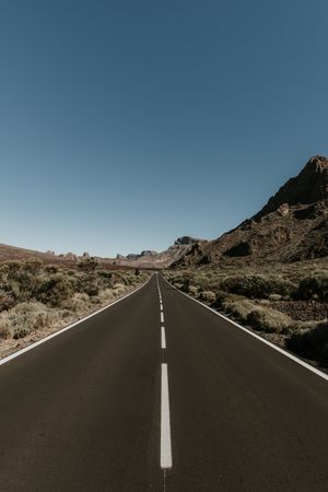 Road in desert to hills