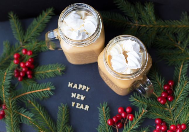 Christmas holiday background with hot cocoa marshmellou. The inscription Happy New Year.