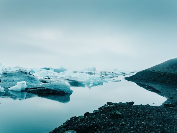 Ice on water between snow