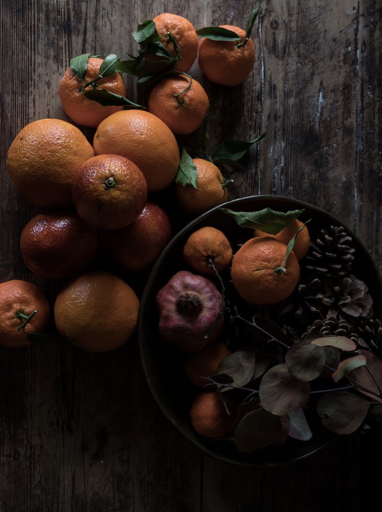 Citruses on wooden table