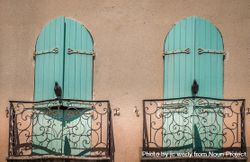 Two bright French windows with birds perched 0vm2Lb