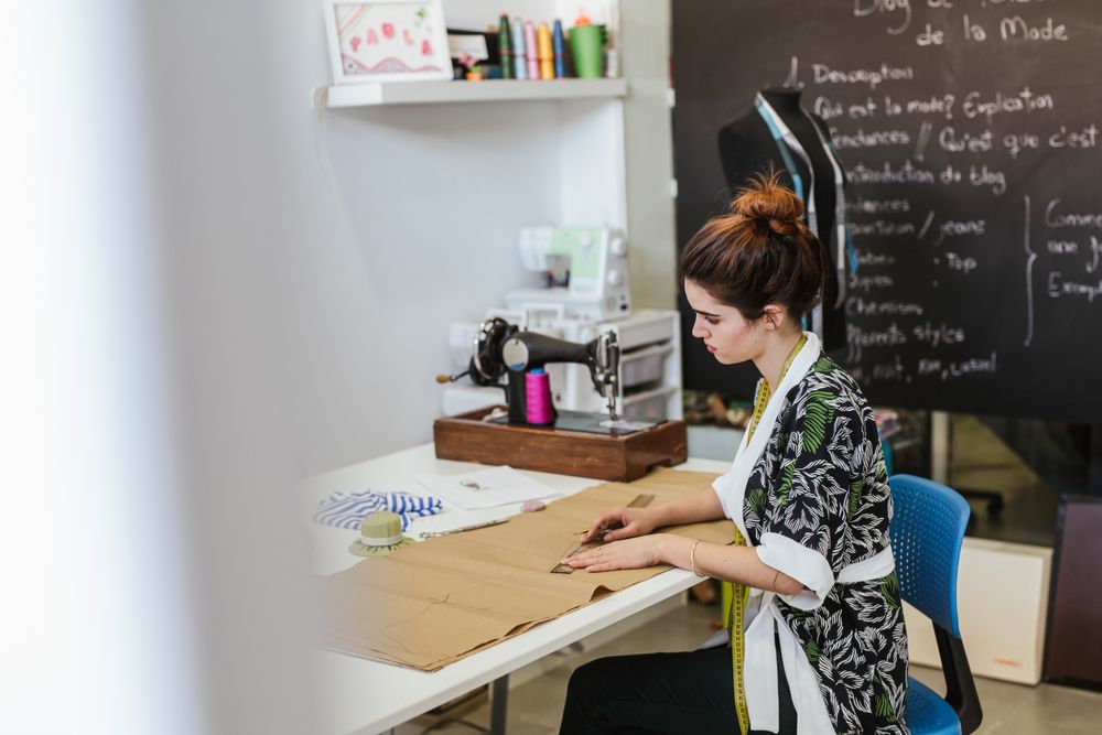 Woman in a sewing school
