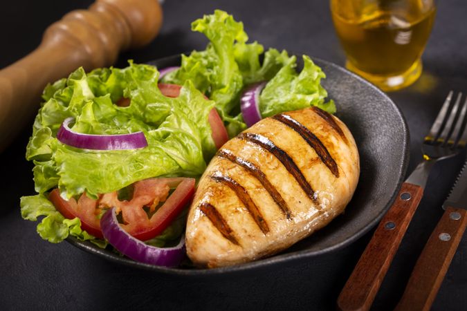 Tasty grilled chicken with salad.