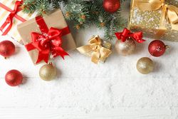 Christmas baubles and accessories on decorated background, copy space