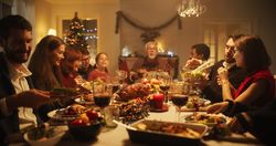 Portrait of a Female Dining Together at a Big Table with Family Members.
