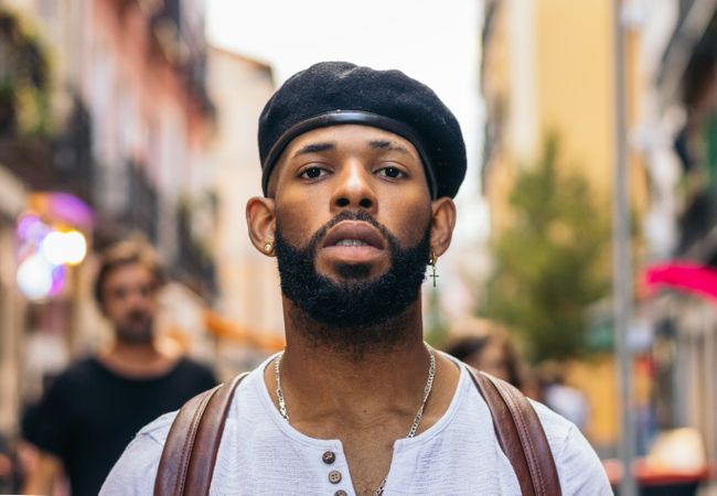 Portrait of a stylish Black man outdoors