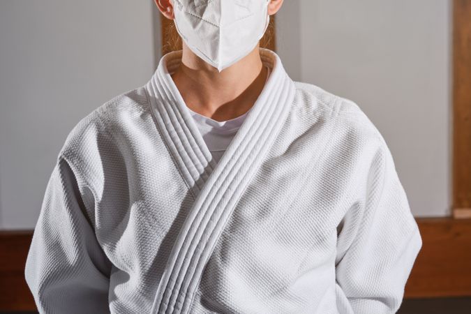 Woman in mask wearing kimono