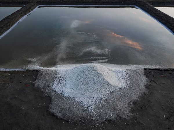 Salt mound on the edge of its salt pan