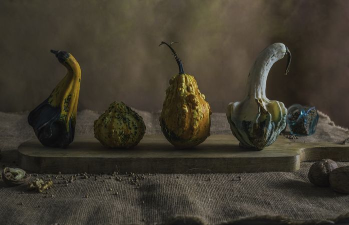 Small different pumpkins with condiments