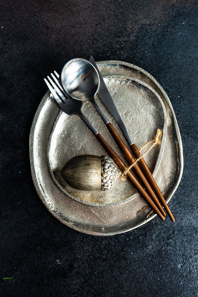 Silver ceramic plates with hazelnut ornament