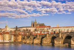 Charles Bridge under a cloudy sky