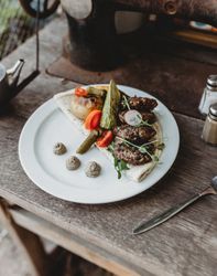 arabic kebab plate with vegetables