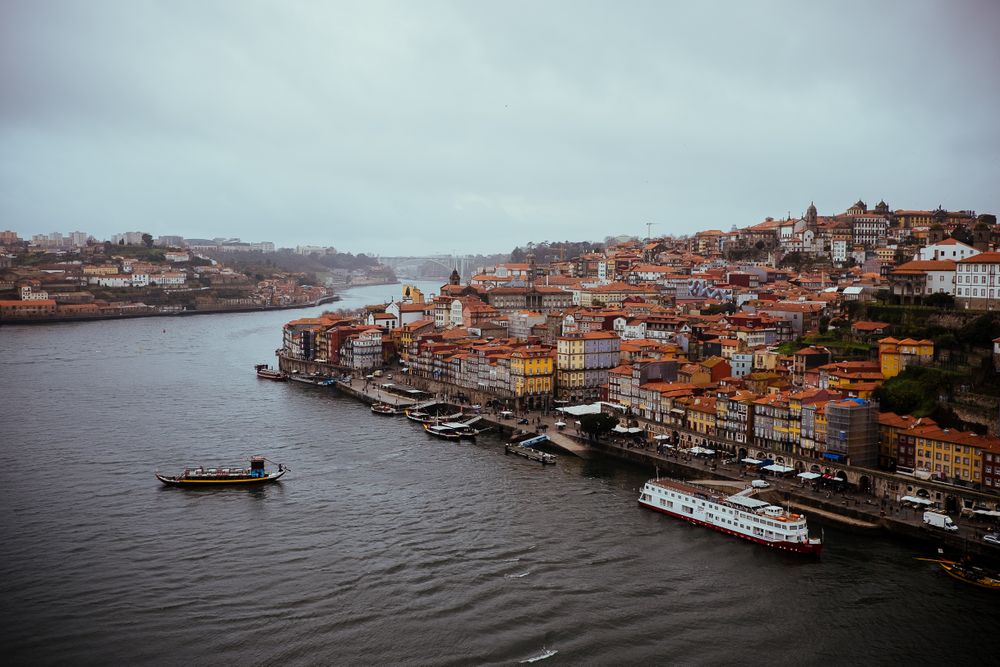 PORTO, PORTUGAL - February, 11, 2019 : Vessels floating near old city