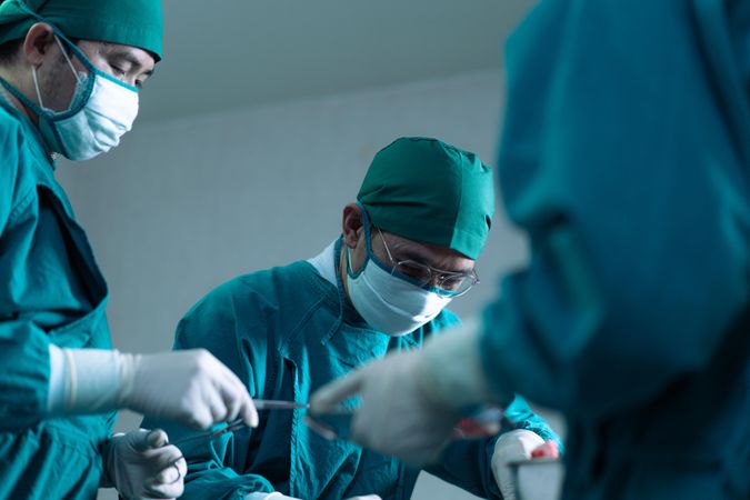 Group of doctors working in surgery