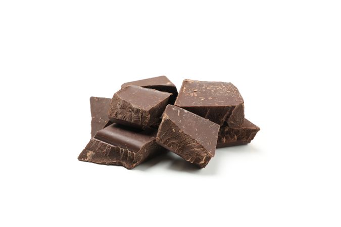 Tasty chocolate pieces isolated on plain background