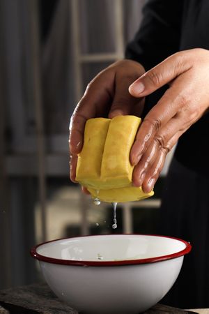 Preparing Yellow Milk Tofu, Female Chef Cleaning Tahu Kuning