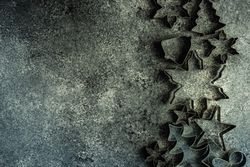 Top view of cookie cutters on table with space for text