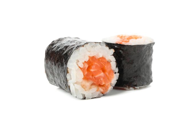 Japanese food. Delicious sushi rolls isolated on light background
