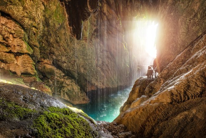 Exotic cave with mountain river
