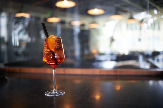 Side view of aperol spritz in a bar