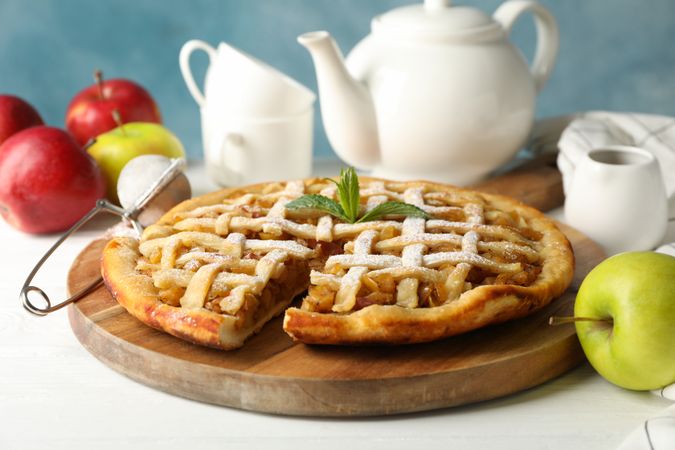 Tasty apple pie on  wooden background, close up. Homemade food
