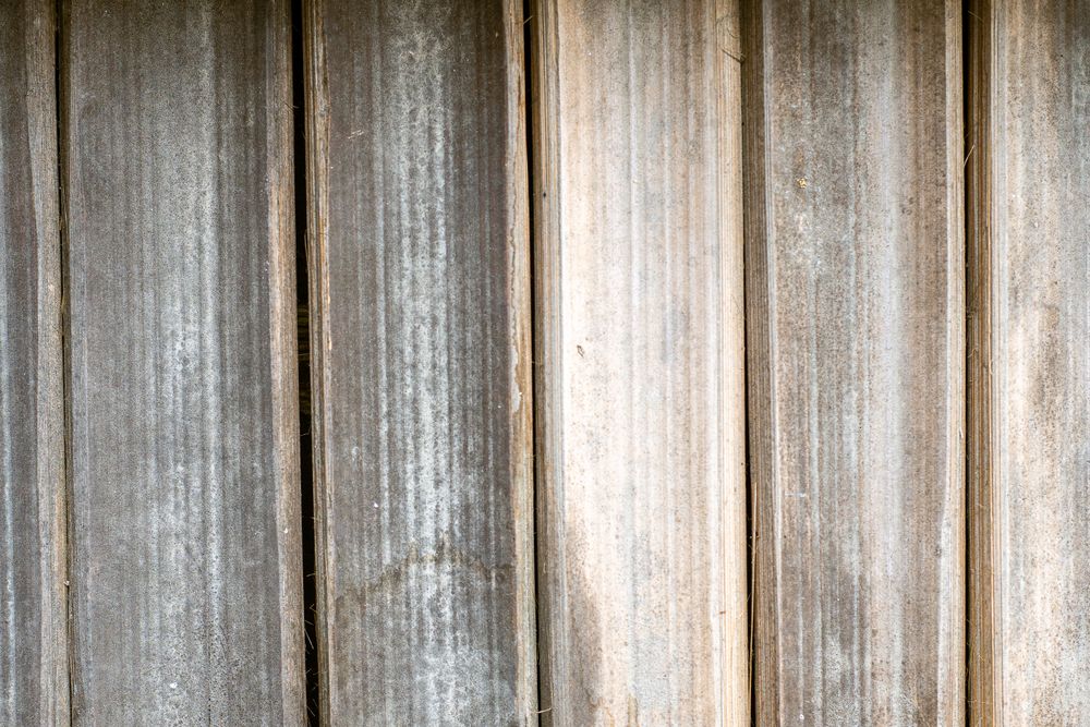 The image is of a wooden surface with a grainy texture