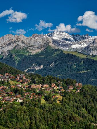 Summer travel to the Swiss Alps. Sun, warm beautiful weather, relaxation and travel.