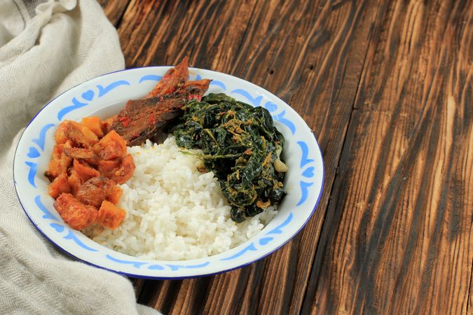 Steamed Rice with Kentang Balado, Tongkol Pedas, and Stir Fry Papaya Leaf