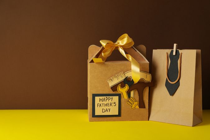 Father's day concept, gifts and greetings, on a brown background.