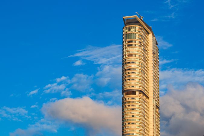 Brown high-rise building under blue sky