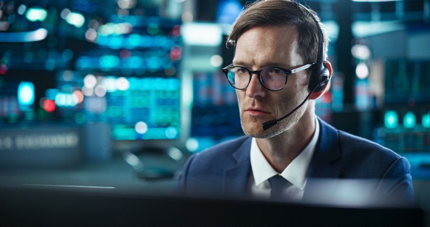 Professional Investor Communicating with Business Partners Online.