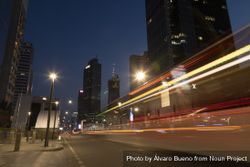 Jakarta, Indonesia - Oct 20, 2019: Night traffic lights in downtown Jakarta, between skyscrapers bErj60