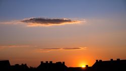 Burning orange and blue sky at sunset in France